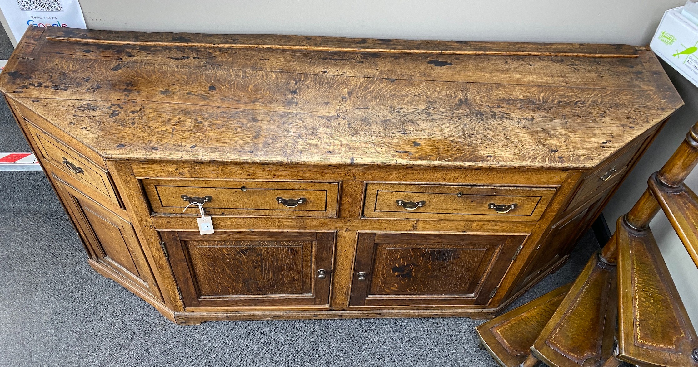 An 18th century oak low dresser, length 174cm, depth 48cm, height 87cm